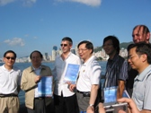 Members walking along the Harbour