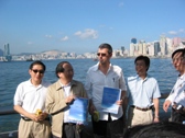 Members walking along the Harbour