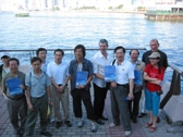 Members walking along the Harbour