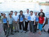 Members walking along the Harbour